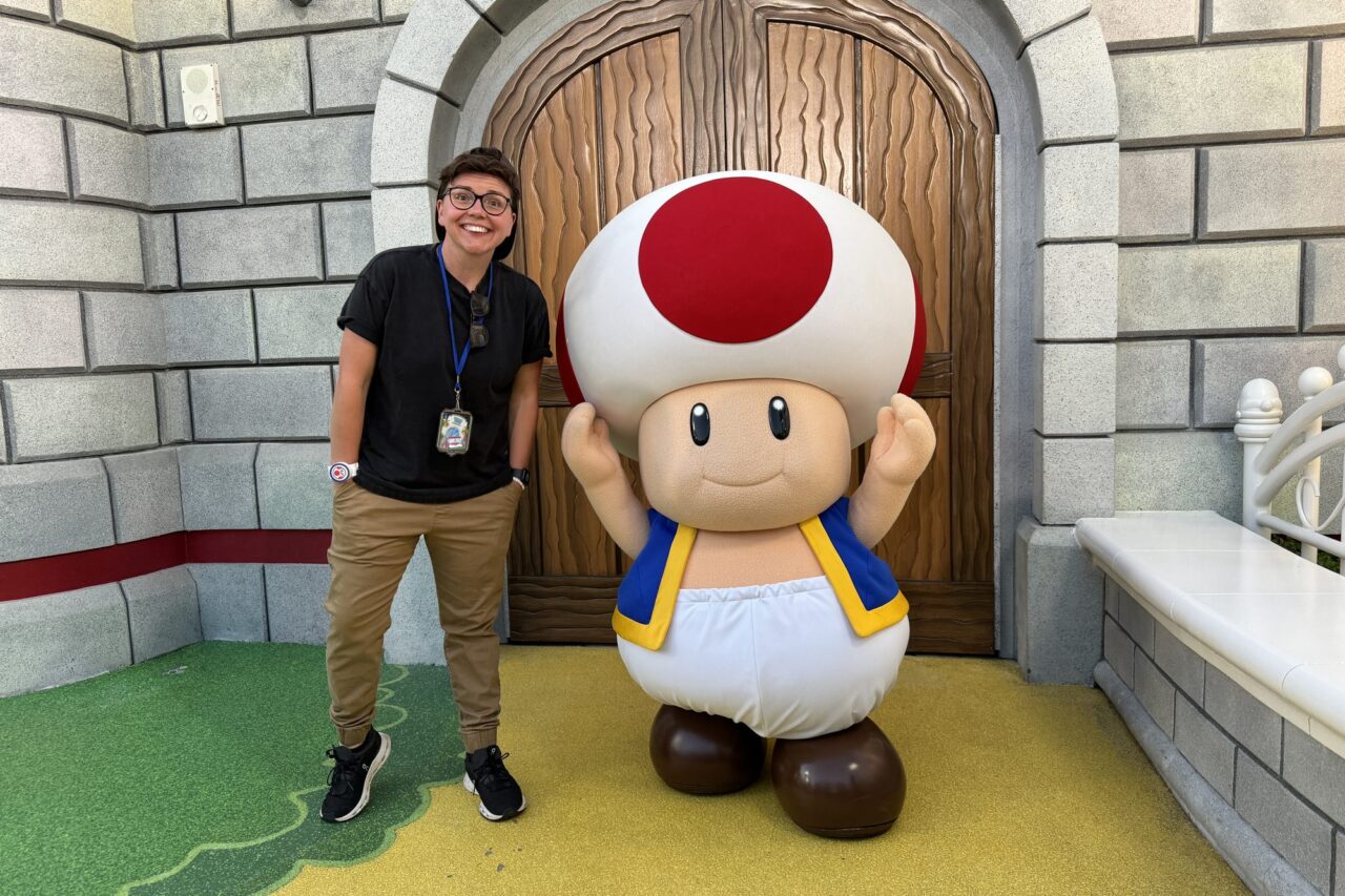 Cora meeting Toad at a Super Nintendo World character meet and greet