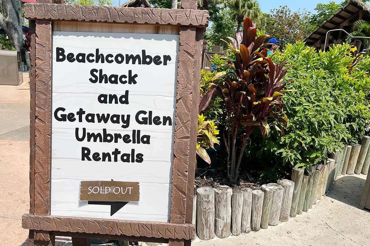 Sign for cabanas and premium seating rental at Typhoon Lagoon at Walt Disney World water park.