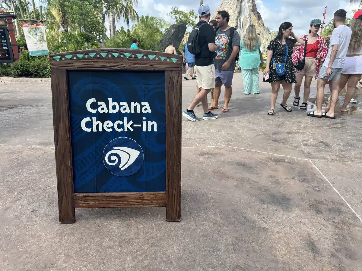 Cabana check-in sign at Volcano Bay, May 2026