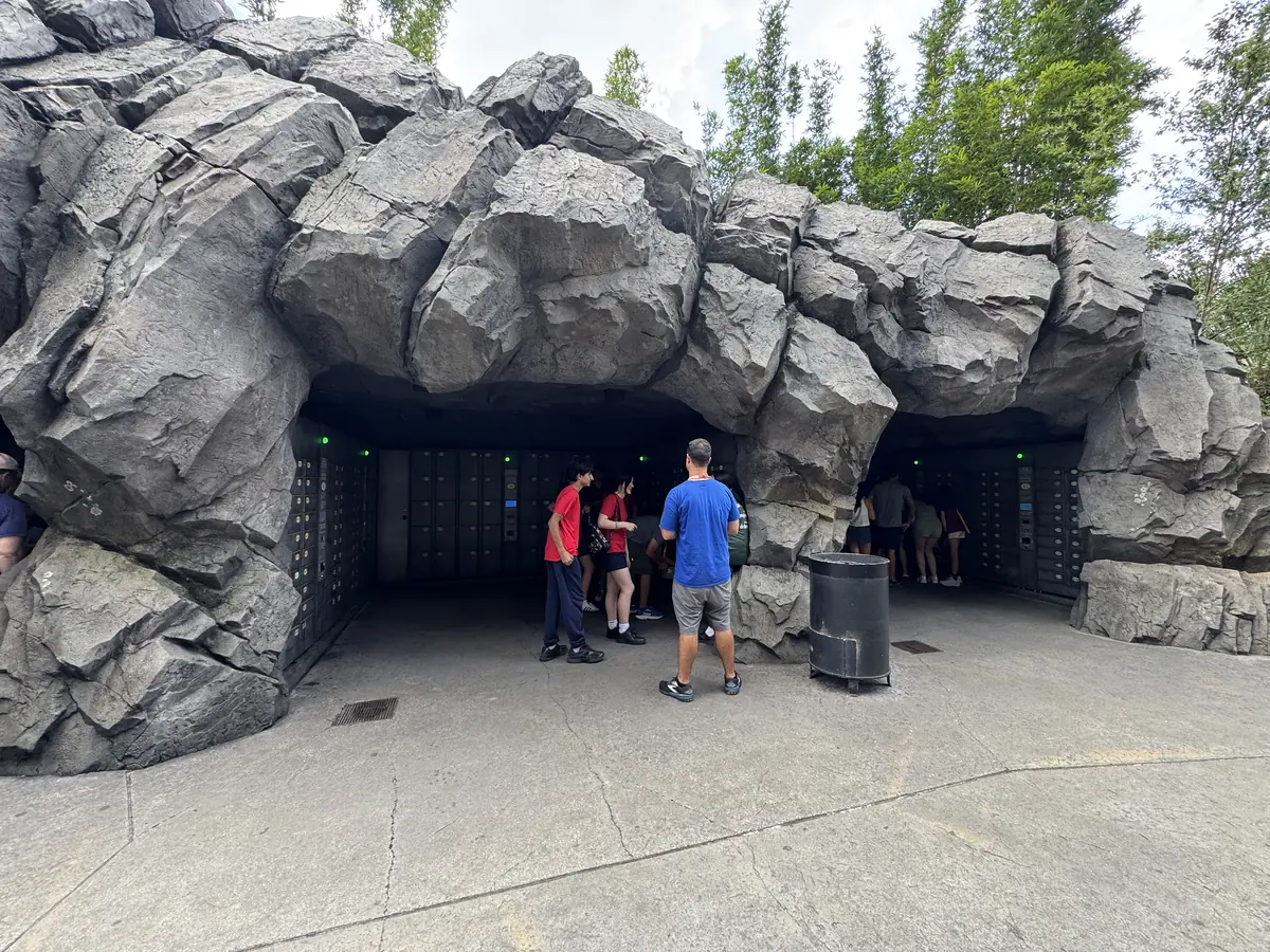 Rock-cave themed entrance to the Forbidden Journey free attraction locker area at Islands of Adventure, Universal Orlando Resort