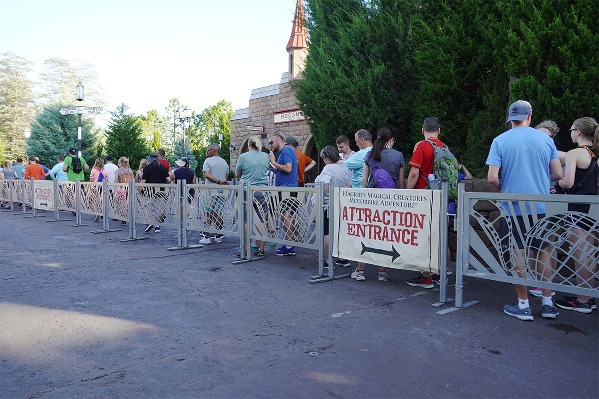Queue for Hagrid's Magical Creatures Motorbike Adventure at park opening in The Wizarding World of Harry Potter at Islands of Adventure