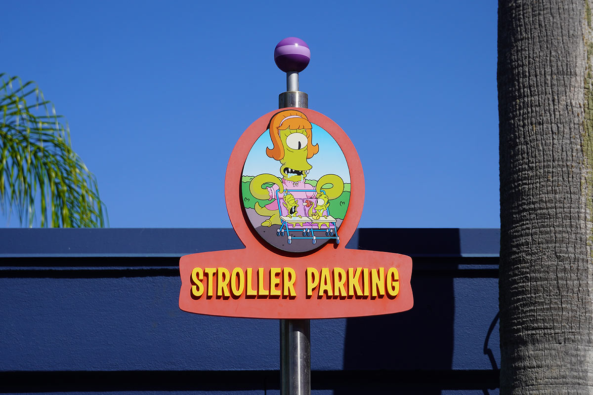 Stroller parking sign at Universal Orlando showing where to park your pram before an attraction.