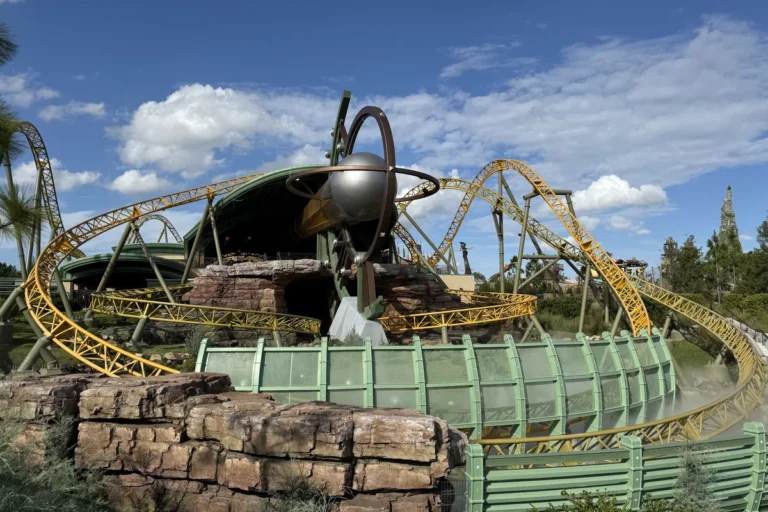 Stardust Racers dual-launch racing coaster with yellow track and cosmic sphere at Celestial Park, Epic Universe
