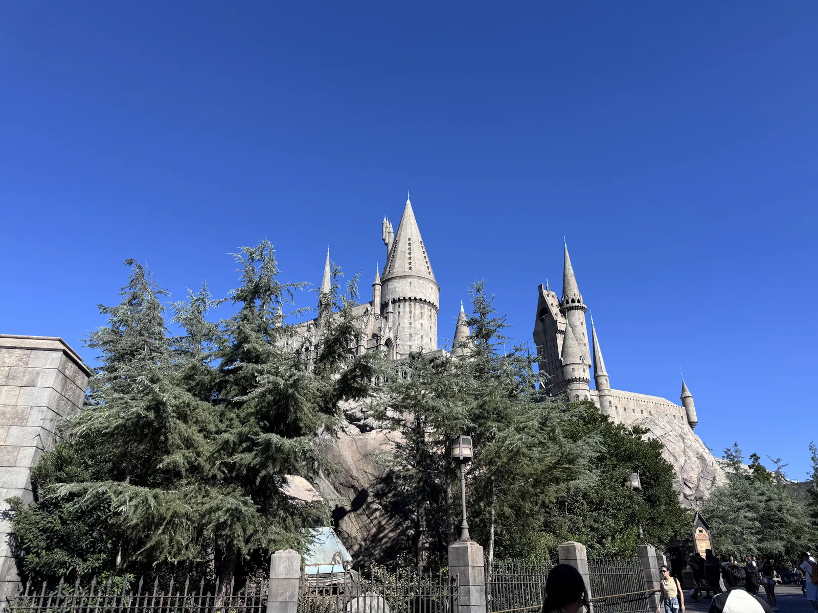 Hogwarts Castle against a blue sky in The Wizarding World of Harry Potter at Universal Studios Hollywood