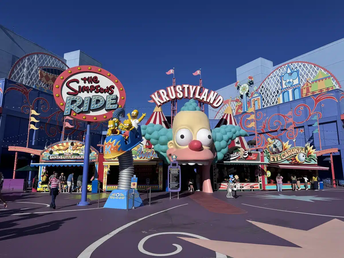 The Simpsons Ride Krustyland entrance with the Krusty the Clown face at Universal Studios Hollywood