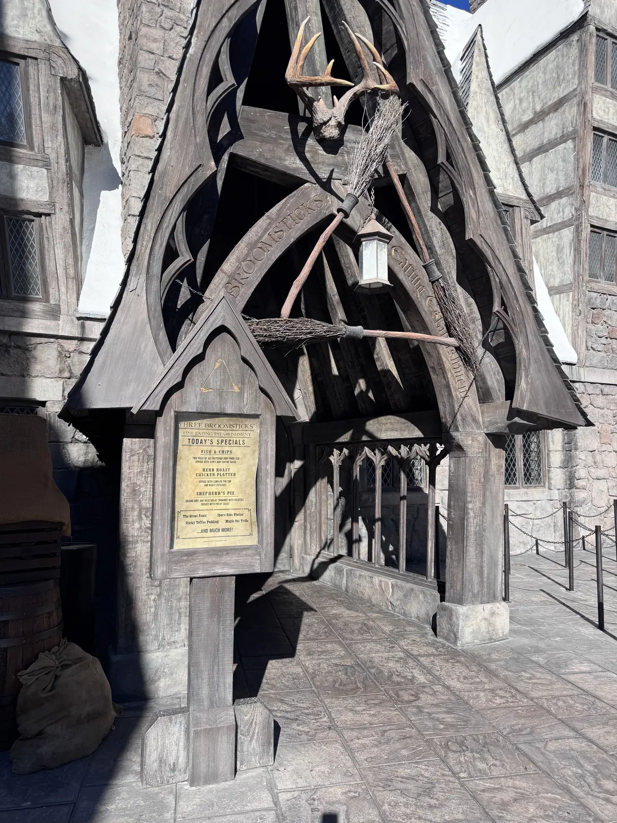 Three Broomsticks entrance and specials board in Hogsmeade at Universal Studios Hollywood