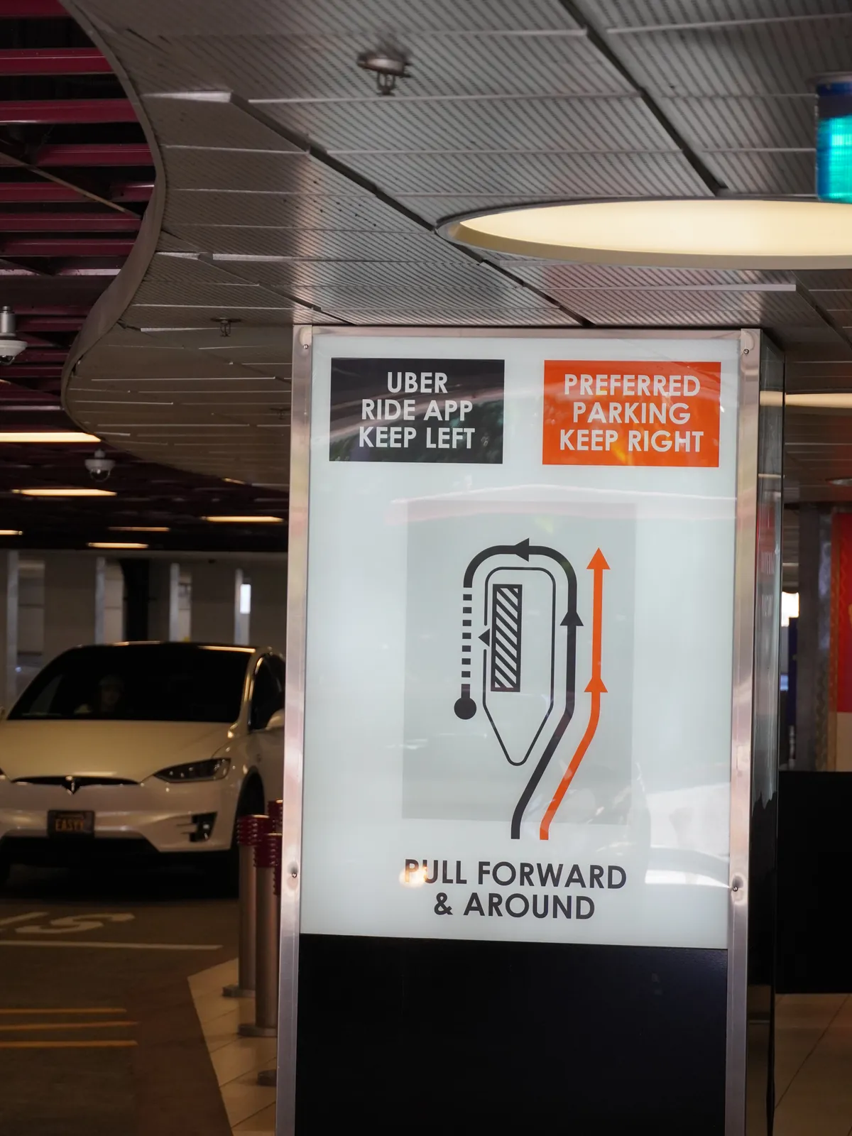 Uber keep left and Preferred Parking keep right sign at the Frankenstein Parking Garage entrance at Universal Studios Hollywood