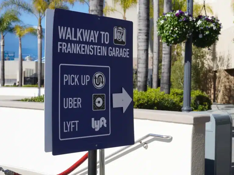 Walkway to Frankenstein Garage sign showing the pick-up point for Uber and Lyft at Universal Studios Hollywood