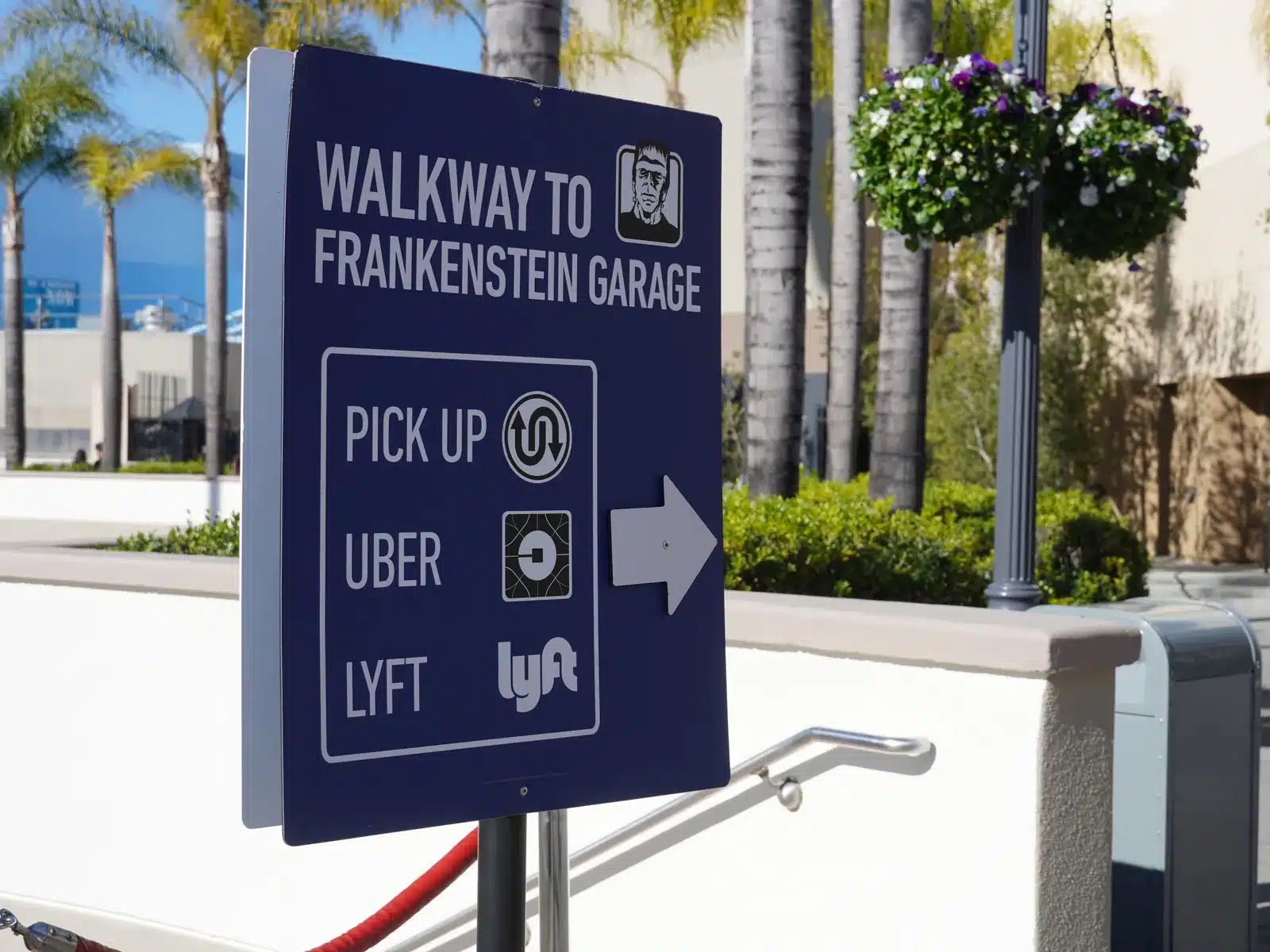 Walkway to Frankenstein Garage sign showing the pick-up point for Uber and Lyft at Universal Studios Hollywood